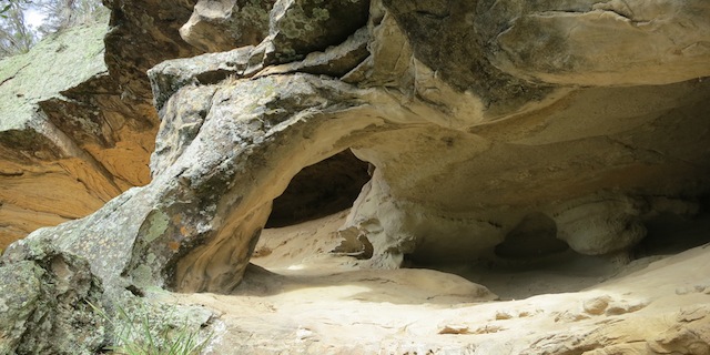 Cave with sloping rock pillar
