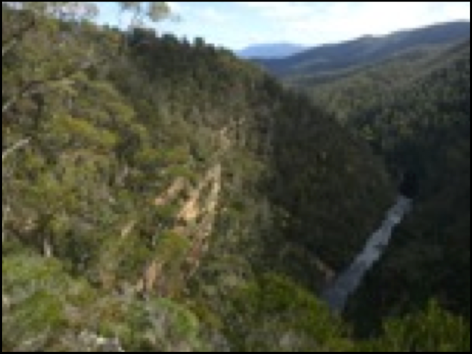 Landscape photograph of cliffs and gorge, showing severe blurring.
