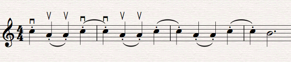 Sequence of crotchets with staccato notes, slurred in pairs to indicate bowing.